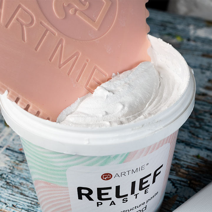 Open bucket of ARTMiE 3D Relief Paste with a thick, creamy consistency